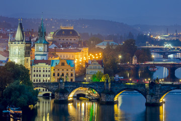 Famous View of Prague, bridges and landmarks at evening time