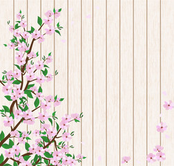 flowering branches on a light wooden background