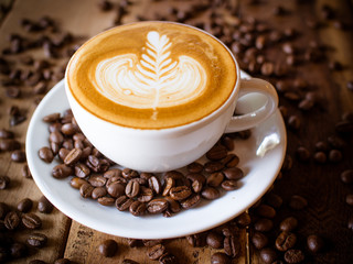 Cup of coffee latte in coffee shop