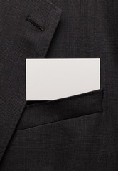 Business card in suit pocket