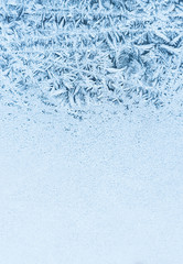 Winter background, frost on window