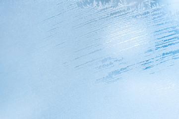 Winter background, frost on window