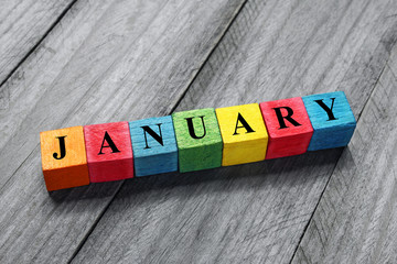 january text on colorful wooden cubes - obrazy, fototapety, plakaty