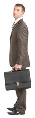 Businessman standing with suitcase