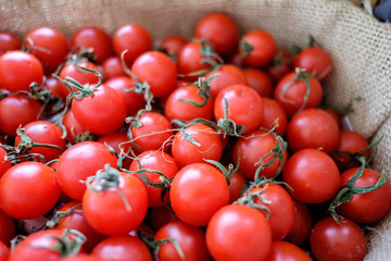 Piles of Tomatoes in weave basket