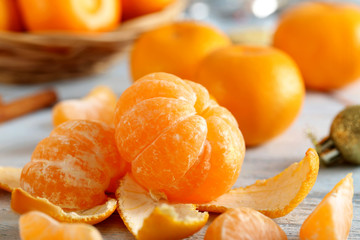 Ripe mandarins on a blue wooden table