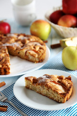 Homemade apple cake on blue wooden table