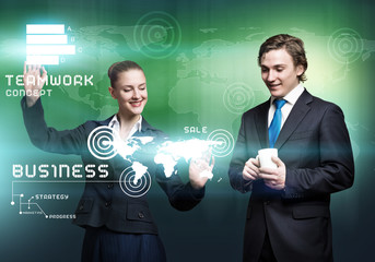 Businesspeople using modern technologies