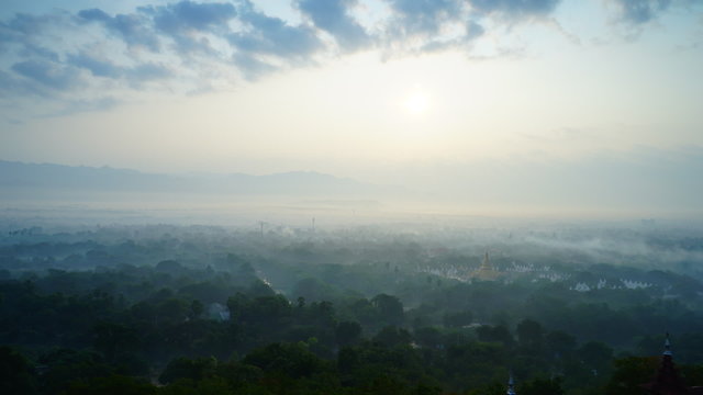 Timelapse of beautiful sunrise over Mandalay Hill. Mandalay. Myanmar. Best famous place to see sunrise at Mandalay region.