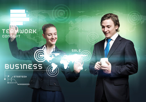 Businesspeople using modern technologies