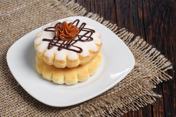 Small round cake with chocolate cream