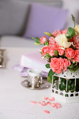 Beautiful rose in vase in room