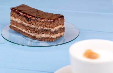 Cappuccino and coockie on a table
