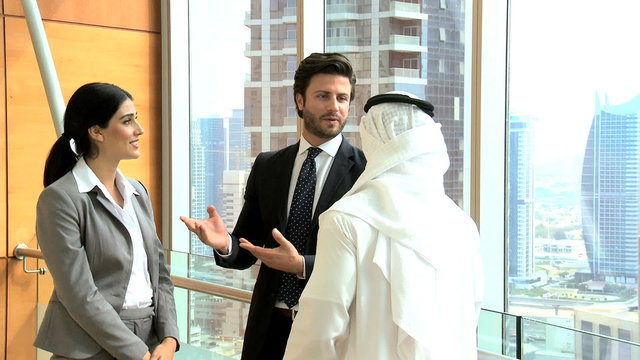 handshake male female Gulf Region international business team trade oil growth