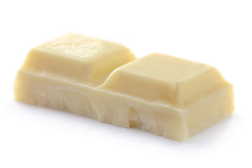 White chocolate pieces isolated on white background