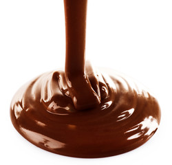 Melted milky brown chocolate pouring, isolated on white