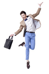 Stylish businessman with a briefcase jumping excitedly