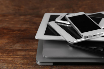 Gadgets on wooden background