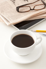 Office items and coffee on desk