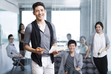 Obraz premium Happy office workers in the company