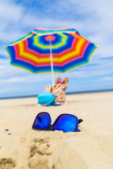 Blue sunglasses umbrella background