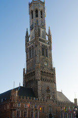 Fototapeta na wymiar The belfry of Bruges, or Belfort, is a medieval bell tower in the historical center of Bruges, Belgium.
