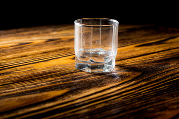 empty glass of vodka on the table