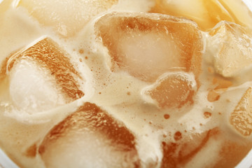 Fototapeta na wymiar Cup of ice coffee, close-up