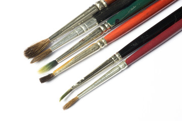 Fototapeta premium used paintbrushes isolated on white background