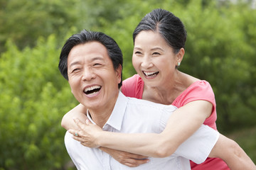 Happy senior couple in a park