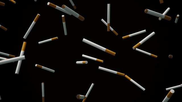 Looping cigarettes floating in space against a black background.