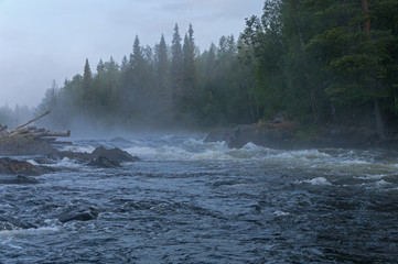 Fog over rapids. Early morning.