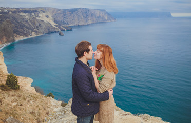 couple in love relaxing, mountain Coast