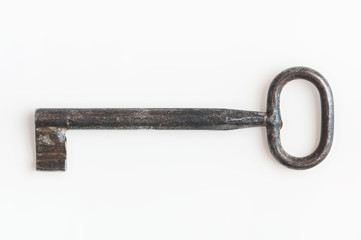 Single old keys on white background. Clipping path.