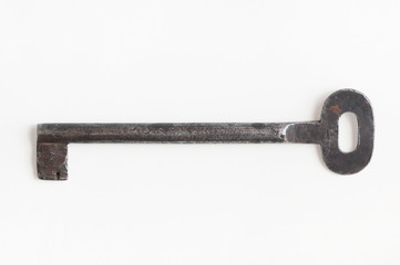 Single old keys on white background. Clipping path.