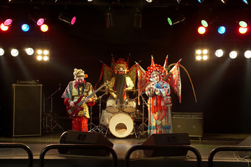 Band In Ceremonial Costume Playing Musical Instruments © Blue Jean Images