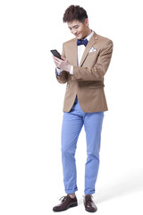 Fashionable businessman with smart phone