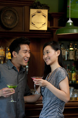 Couple Enjoying Cocktails Together