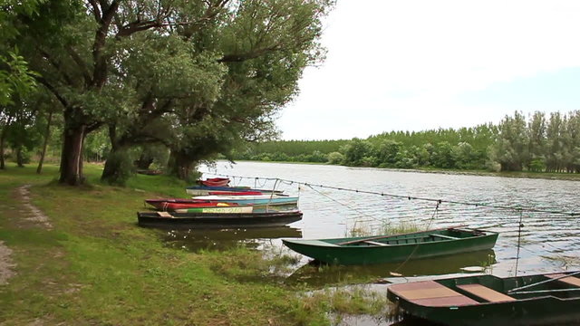 Fishing boats on river bank