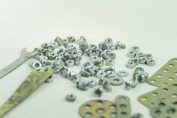 Many small parts nuts and bolts