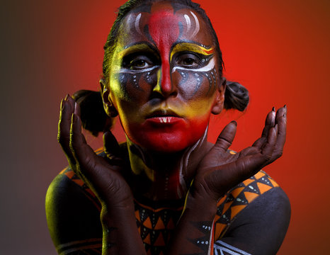 Bodypainting. Woman painted with ethnic patterns