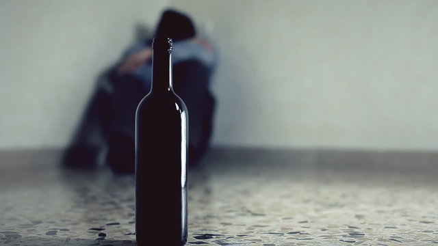 Drunk man wine crying