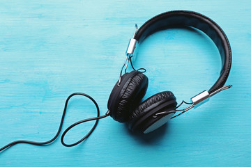 Obraz na płótnie Canvas Headphones on blue background
