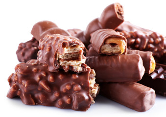 Mix of chocolate bars on table, close-up