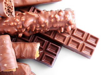 Mix of chocolate bars on table, close-up