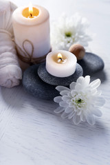 Fototapeta na wymiar Beautiful composition of spa treatment on a white wooden table