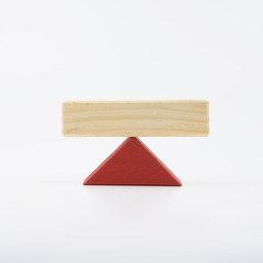 The wooden house. Children's toys - wooden cubes on a white background