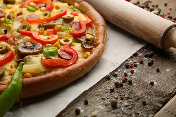 Delicious sliced pizza with vegetables, close-up
