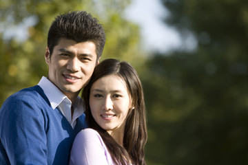 Portrait of a young couple in the park