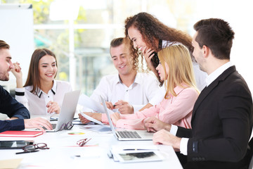 Young business people discussing a new project in a conference room